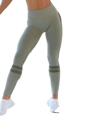 Bombshell Sportswear Seamless Green Compression Leggings. Size XS/S.